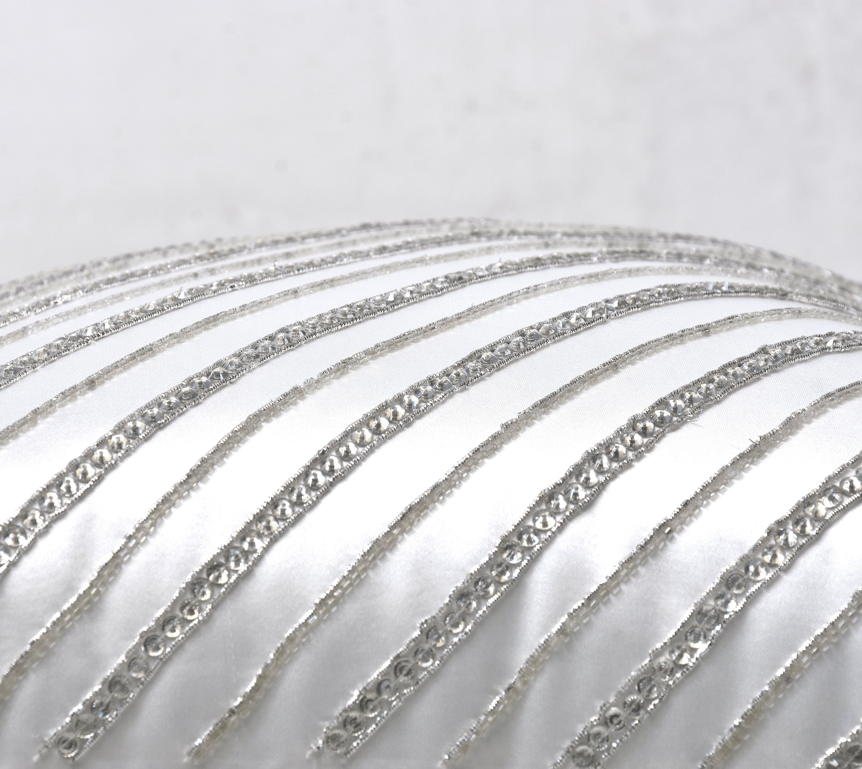 silver and white decorative pillows